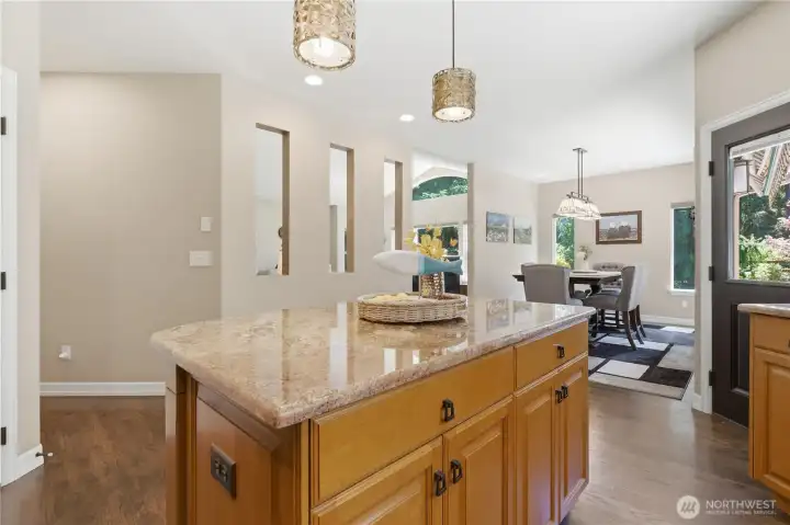 Kitchen opens into the living and dining areas