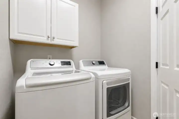 Laundry room with access to the 3 car garage