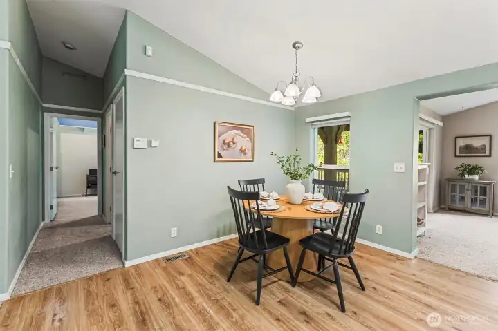 The dining room is adjacent to the kitchen.