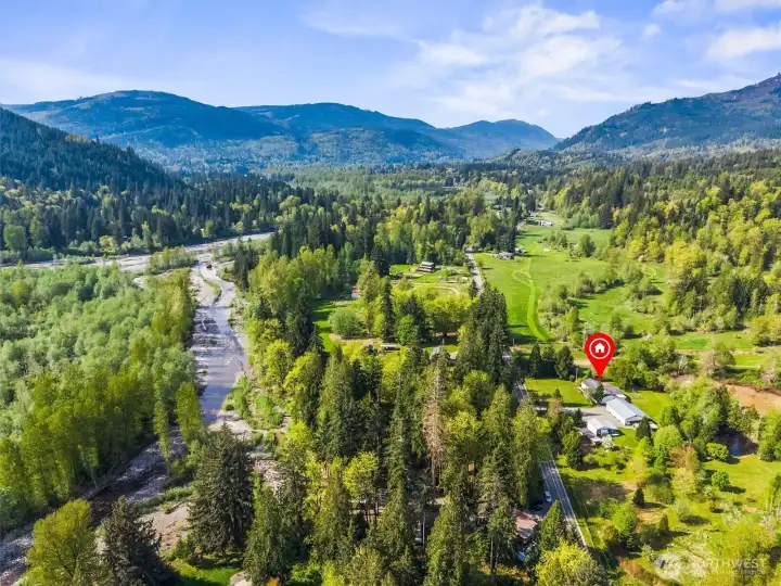 The Middle Fork River winds gracefully through Welcome Valley.