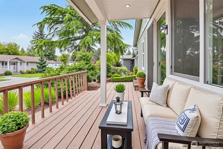 South facing deck off the master bedroom suite.  Virtually staged photo.