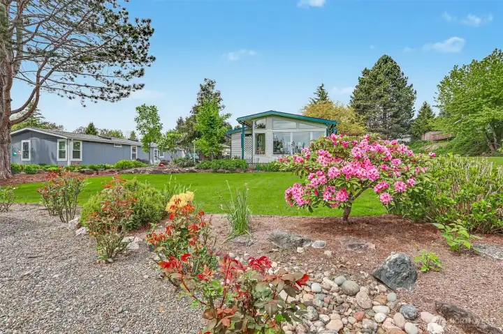 Back patio and courtyard overlooks the community greenbelt that is maintained by the HOA.