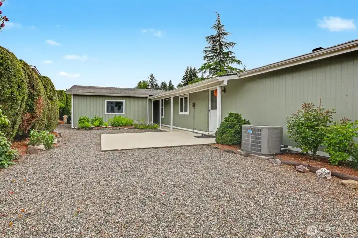 Back patio and courtyard overlooks the community greenbelt that is maintained by the HOA.