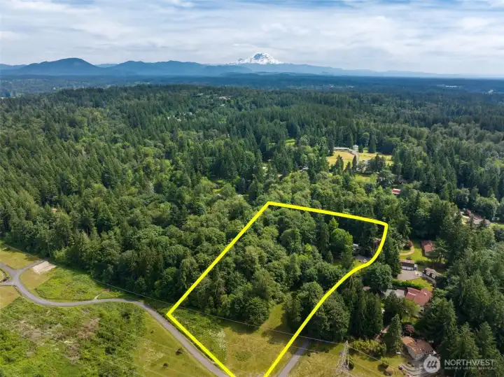 Nestled on a shy 5-acre parcel surrounded by nature, this property offers the perfect balance of privacy, recreation, and convenience. Gentle sloping lot down to the north, plenty of trees, but this could also be cleared more and made into pasture land as well, common in the neighborhood.