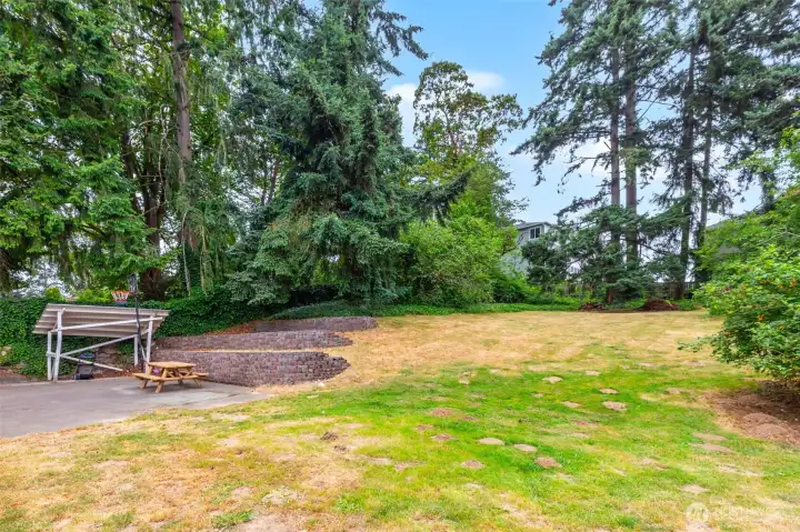 Garden, games, flowers. This yard has room for it all Garden, games, flowers. This yard has room for it all