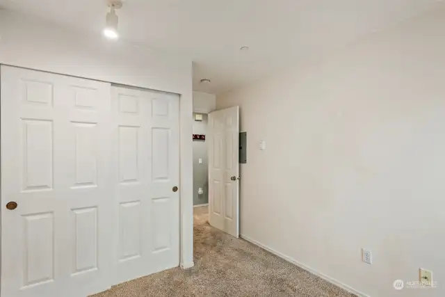 View from bedroom #2 looking at closet & entrance.