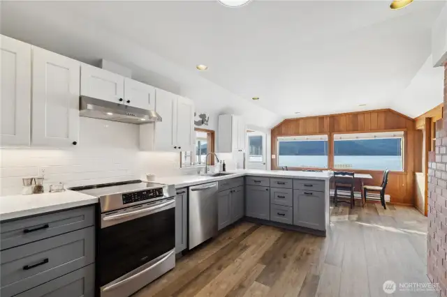 Brand-new kitchen melds into the old-fashioned feel.  And that view!