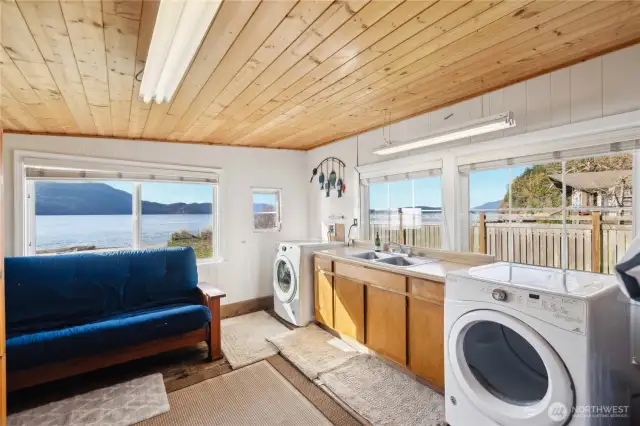 Bunk house with a view and a washer/dryer / sink.