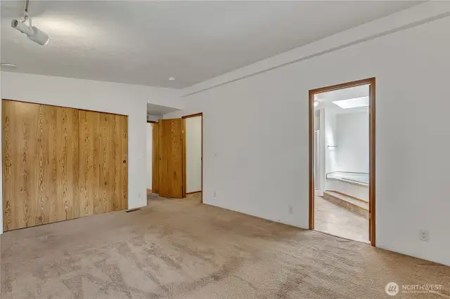 Another view of the primary bedroom.