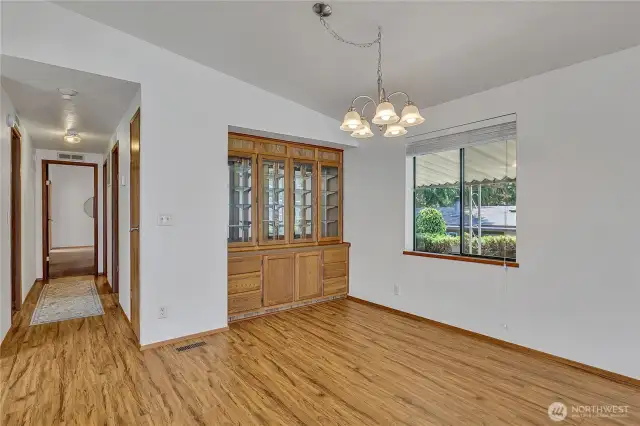 The perfect spot to gather—open layout keeps the flow easy between kitchen and family room and features additional storage in the built-ins.