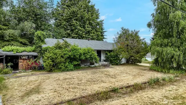 Endless potential! Five bedrooms featured in this rambler with full basement.
