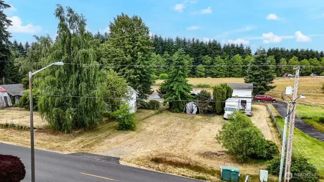 Sitting on a shy two acre parcel, right outside the city limits.
