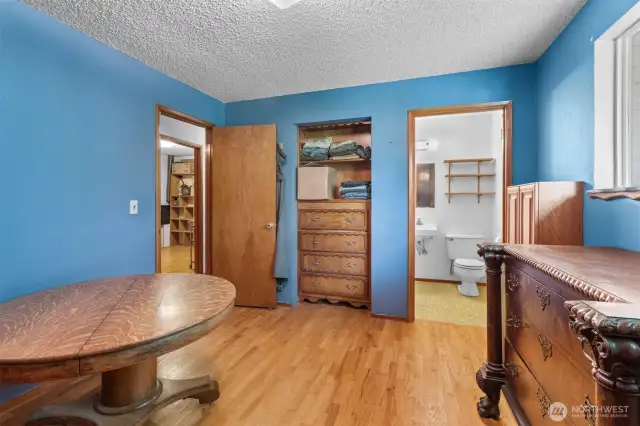 The Primary bedroom offers dual closets plus a private powder room.