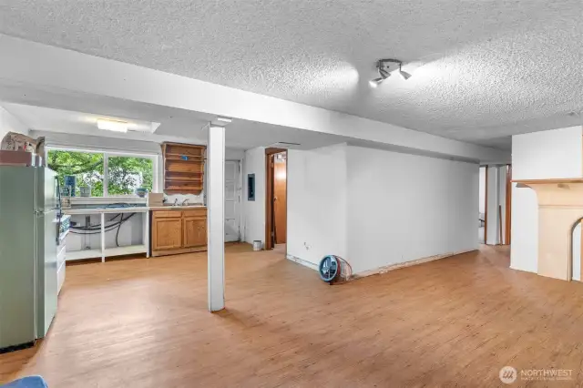 Are you looking for rental income, or for a multi-generational living style? This is it! Separate exterior access plus Kitchen, Living, two bedrooms, and a bath.