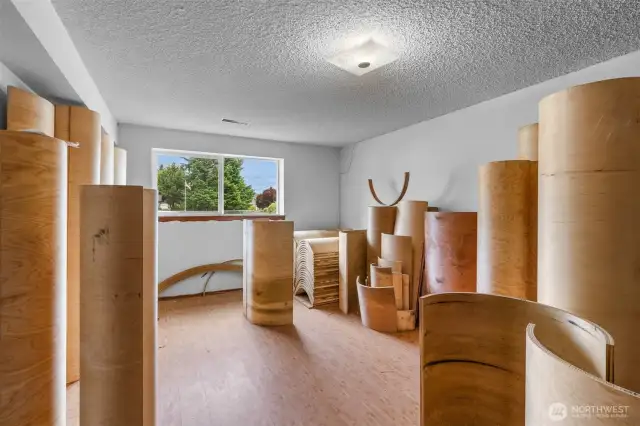 Second large bedroom on the lower level, currently being used as storage space.