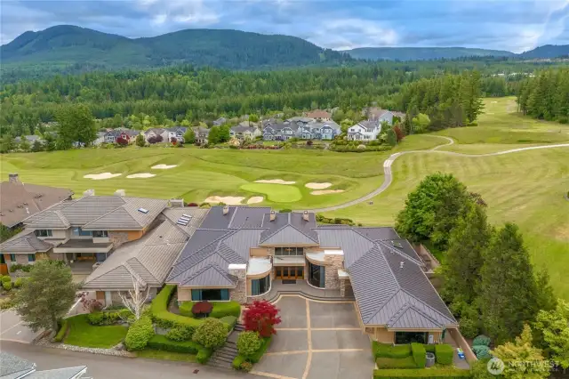 Enjoy sweeping views of the golf course and majestic mountains beyond - an ever-changing landscape of rolling greens, offering both beauty and tranquility from every vantage point.