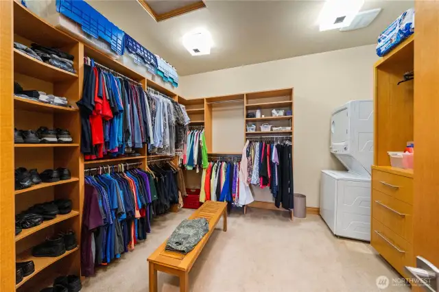 The primary walk-in closet also has its own stackable washer and dryer. No carrying laundry down the hall from your suite!