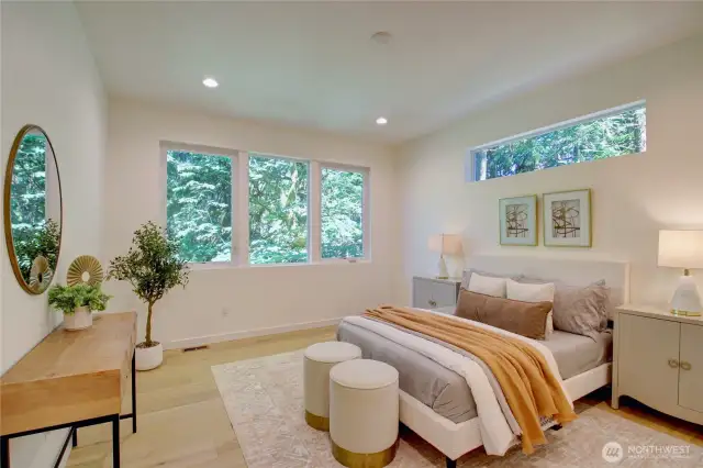 Roomy and light Primary Bedroom located on the main level.