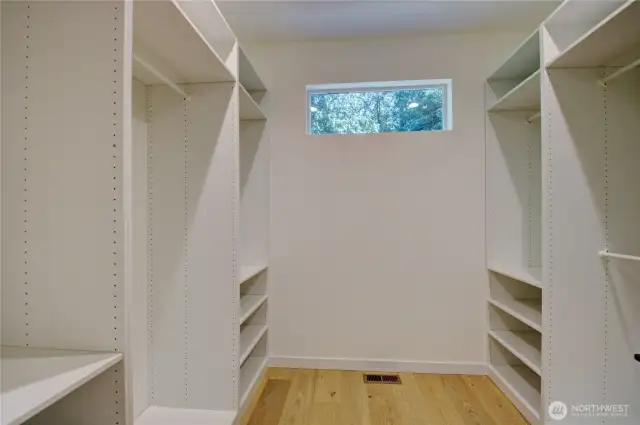 Massive finished walk-in closet in the Primary Bedroom.