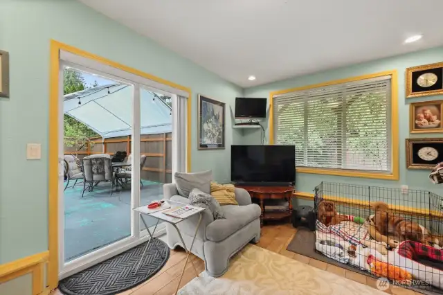 Slider off the family room to the backyard, pool and spa