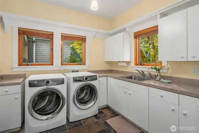 Main floor laundry with laundry shoot