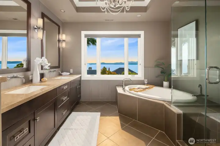 Up/Down shades allow you to adjust as needed for privacy in the well-appointed primary bath.