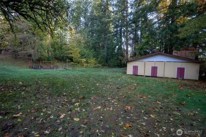 Spacious 24'x33' shop in back of yard complete with power, water and a 50-amp RV hookup with septic connection.