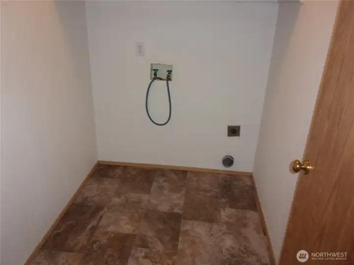 Separate Laundry Room.