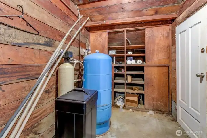 Well equipment and entrance to Back yard, patio and Pasture