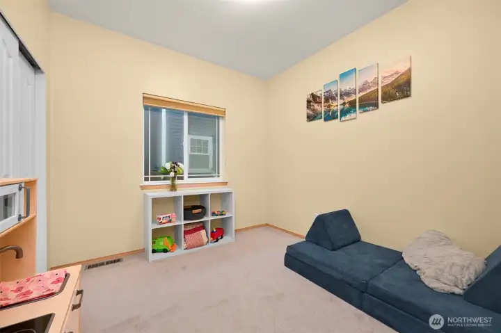 Bedroom 1, Start of hallway near laundry & garage access