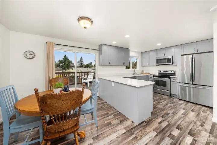 Dining nook with large slider out to the deck.