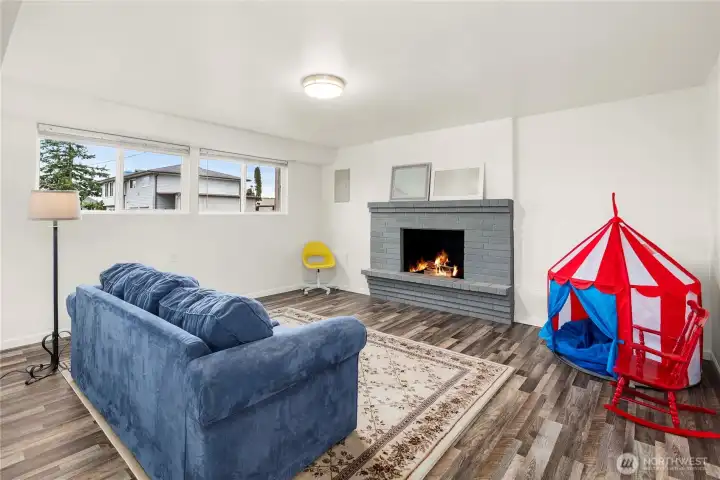 Family room with large sunny windows.