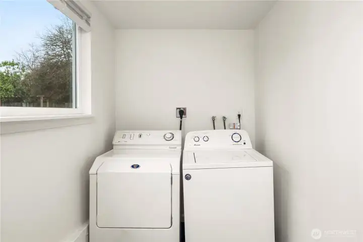 Large laundry room.  Washer & Dryer stays.