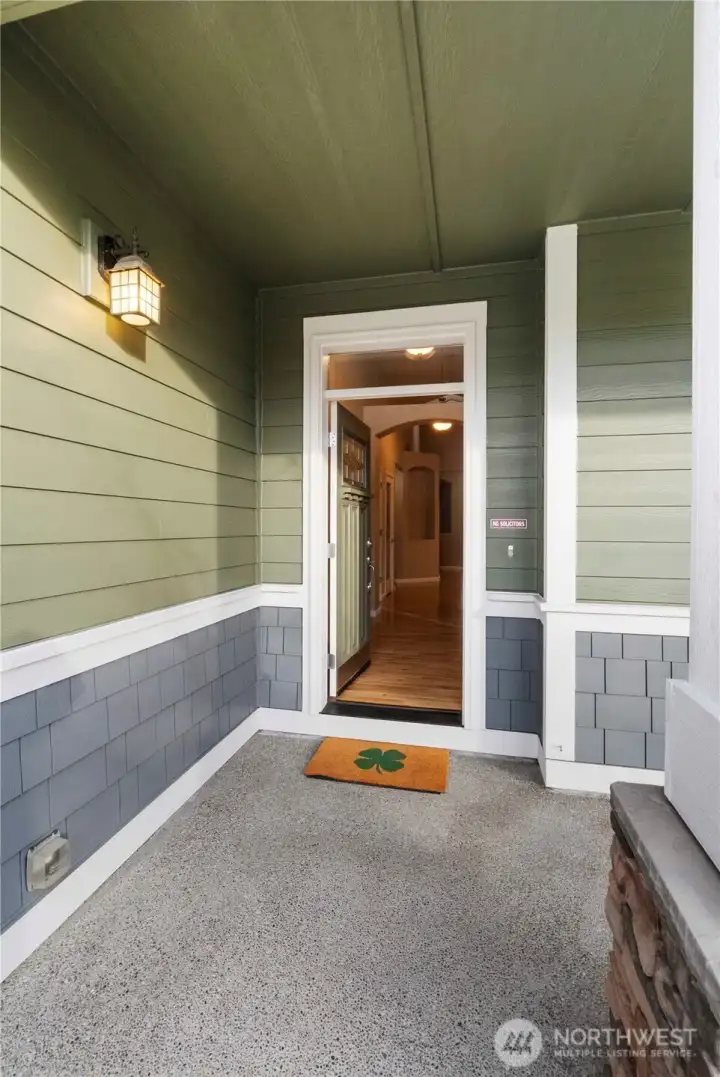 Charming covered front porch welcomes you into this beautifully maintained single-level rambler