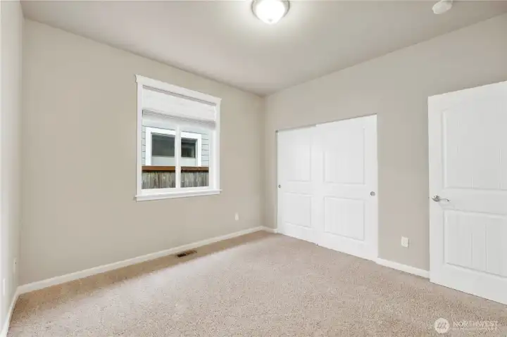 Well-proportioned bedroom #2 offers comfort and versatility