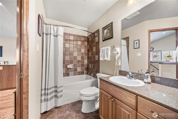 Guest bath with deep tub and bedroom access