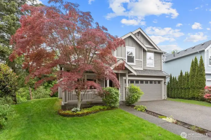 Exterior view of the front of the house with a covered front porch.