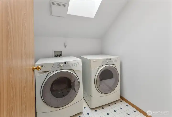 Laundry room with skylight.