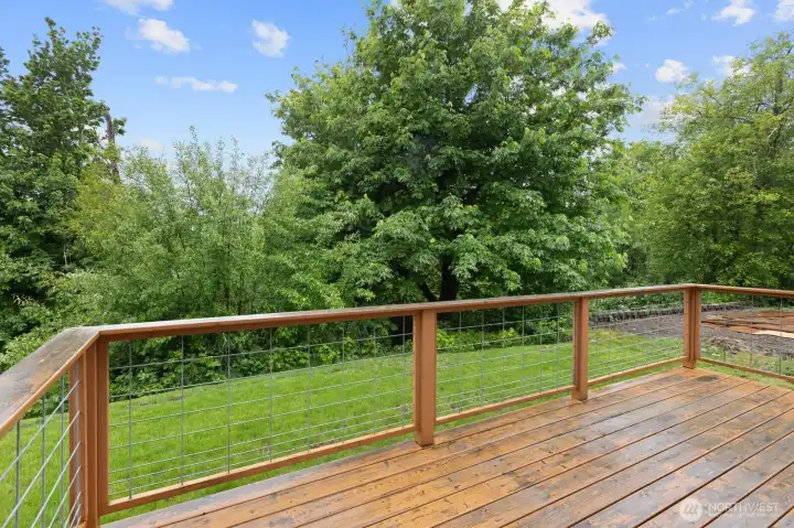 View of the backyard and deck.