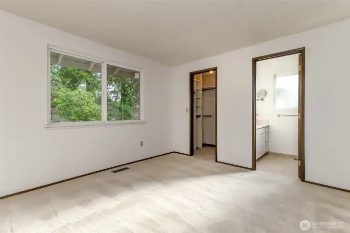 Primary Bedroom with walk in closet and Bath
