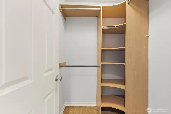 One of 2 walk in closets in primary  - built in safe behind door