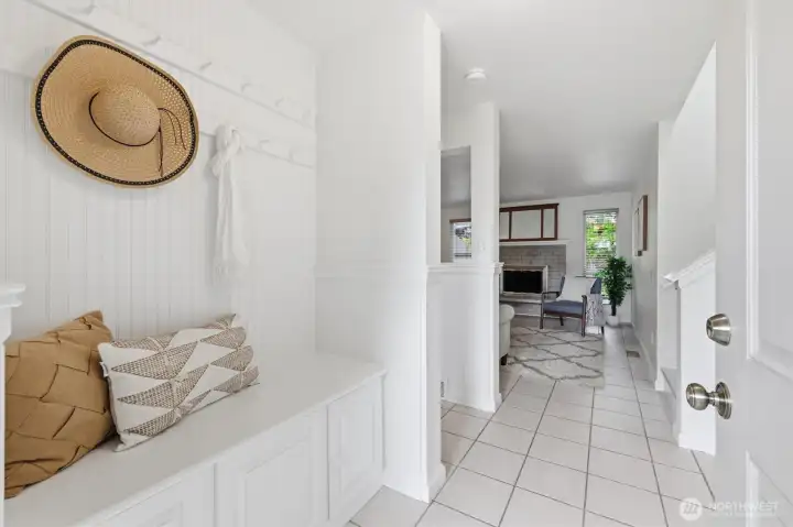 Handy entry with covenient coat rack  and cabinets.