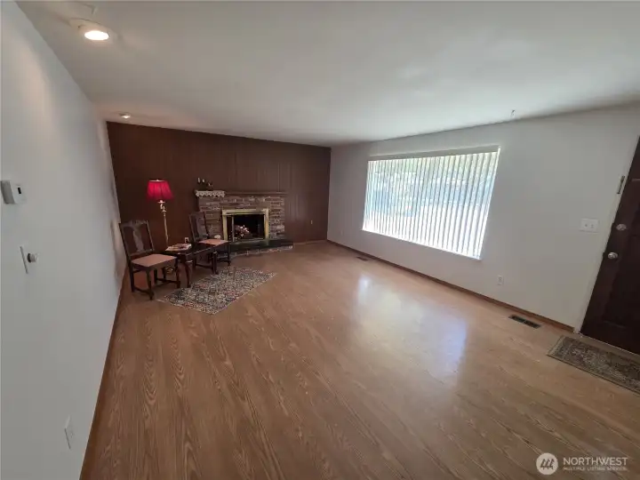 A welcoming classic fireplace promises memories to be made.