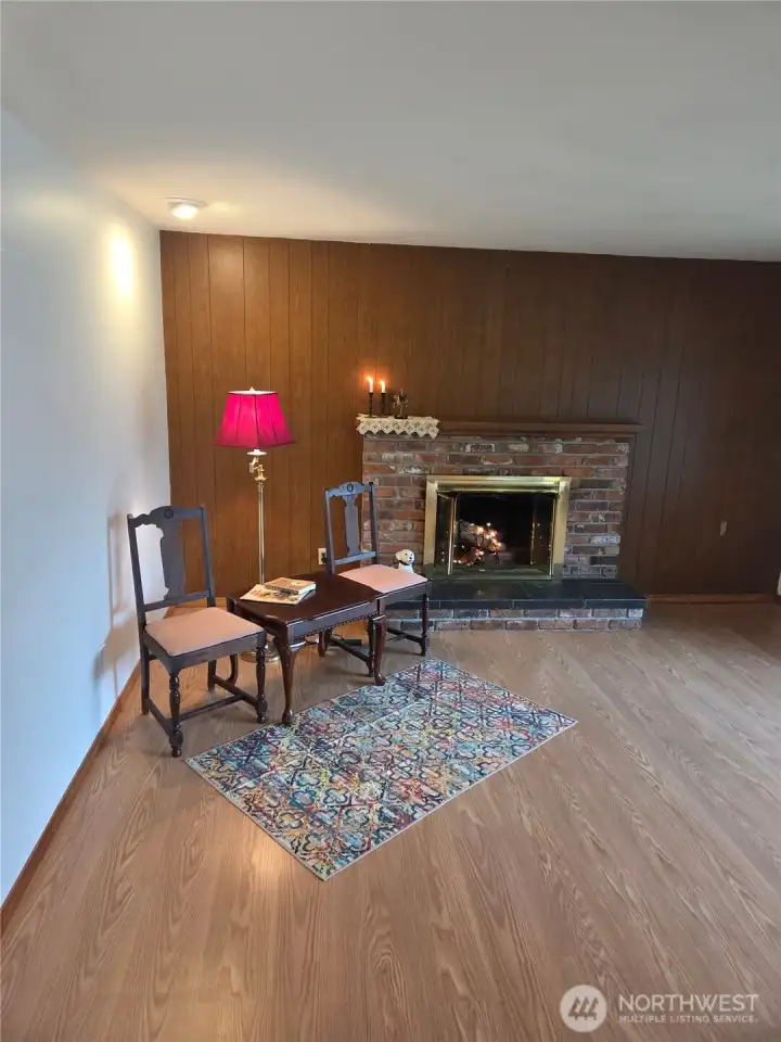 A classic fireplace in a sunny room, with a good book.   hmmmm.