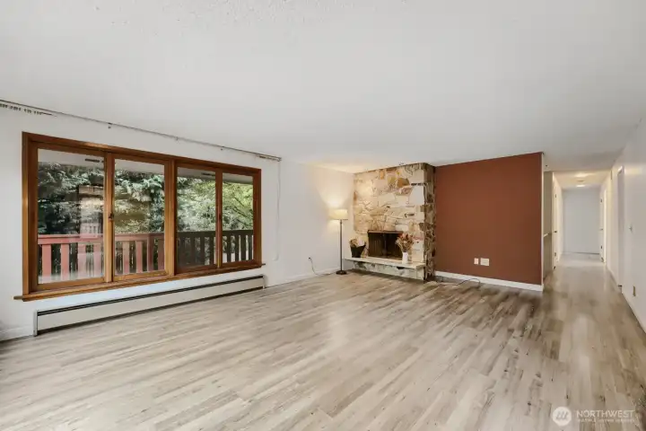 Main living room with wood-burning fireplace