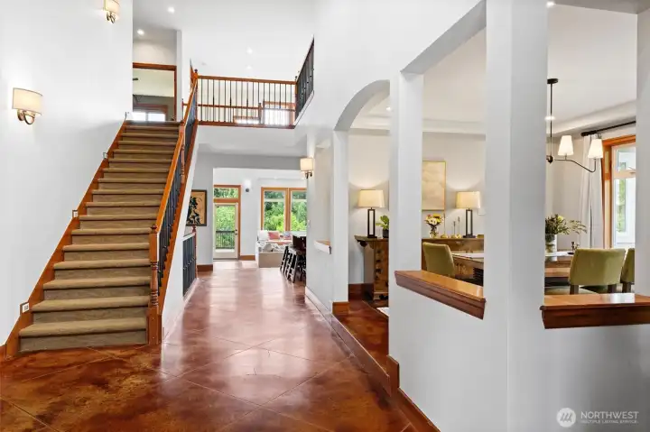 Radiant heat flooring from the entrance through the primary suite