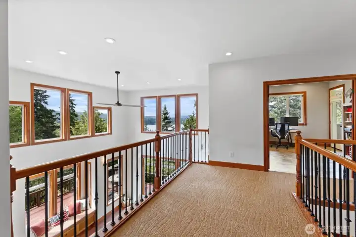Appreciate the views from the upper level's two bedrooms and office