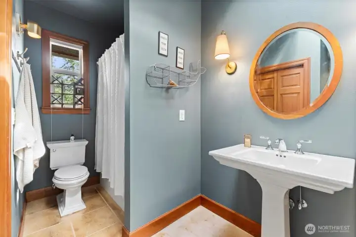 Freshly painted full bathroom upstairs with upgraded light fixtures