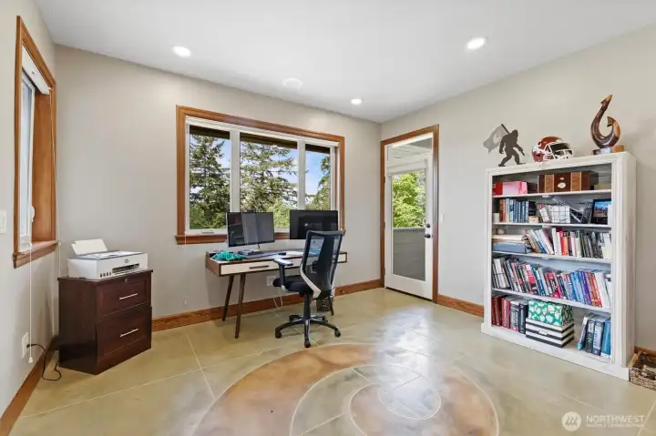 Custom tile floor office with doors to the