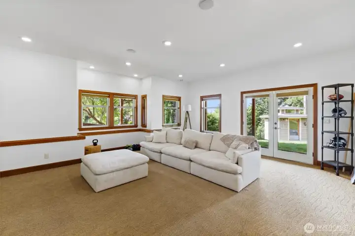 Downstairs living room with French doors to the yard